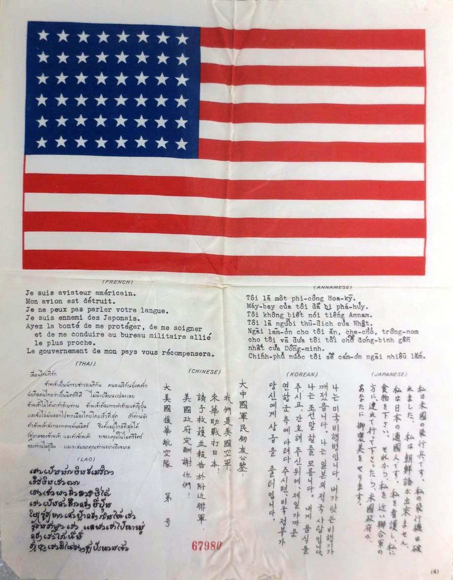 Blood Chit issued to United States Marine Corps fighter pilots with seven languages including French (Indochina), Korean, and Japanese, 1944.