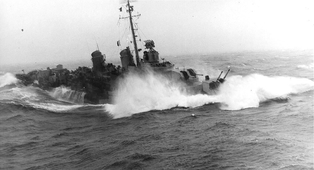Destroyer USS Maddox plowing through heavy seas during Typhoon Cobra, 18 Dec 1944.