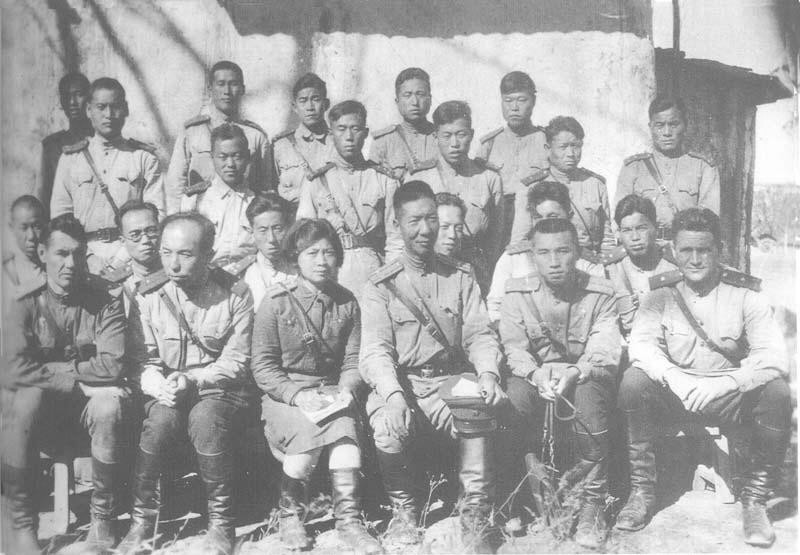Personnel of the Soviet 88th International Brigade after field training, probably at Kerki, Turkmen SSR, Russia, 5 Oct 1943; note commanding officer Major General Zhou Baozhong and Kim Song-ju (later known as Kim Il-sung) in front row