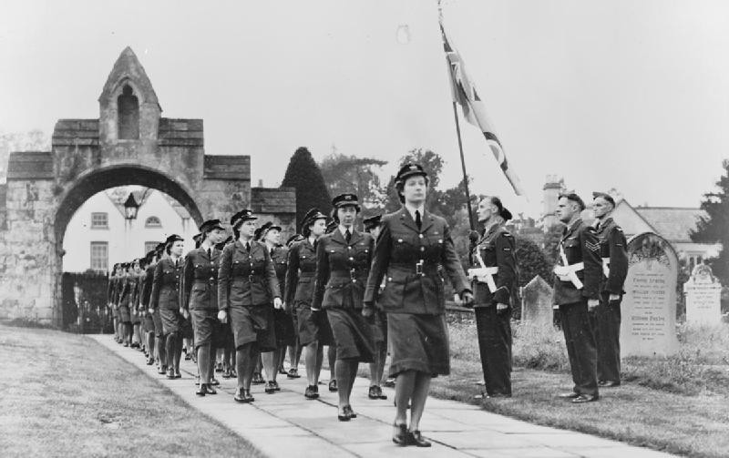 WAAF members during the presentation of a RAF ensign and memorial tablet to the Southwell Minster Cathedral and Parish Church of the Blessed Virgin Mary, Southwell, Nottinghamshire, England, United Kingdom, 1945