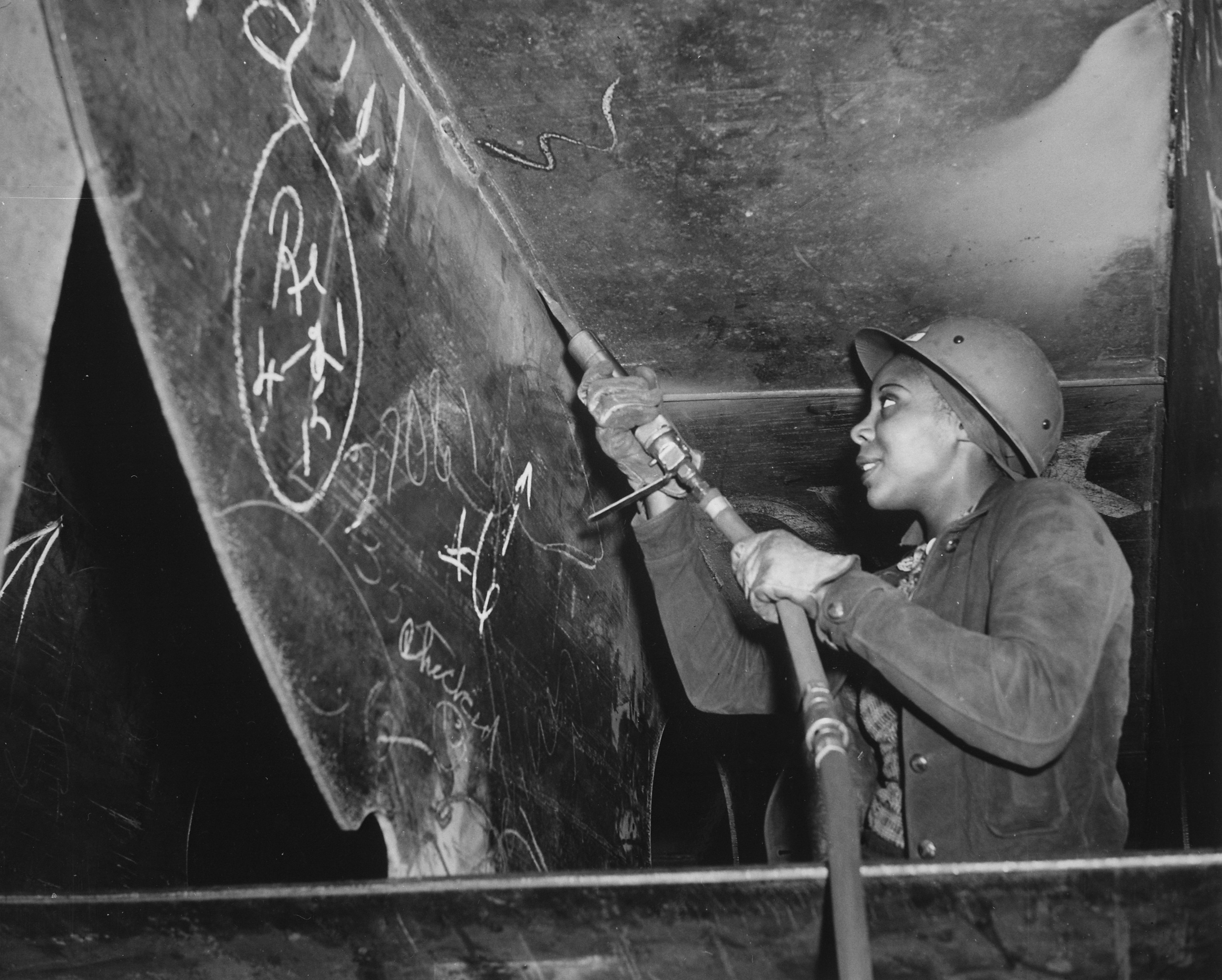 Female African-American worker Eastine Cowner working on Liberty ship SS George Washington Carver, Kaiser Richmond No. 1 Yard, Richmond, California, United States, Apr 1943