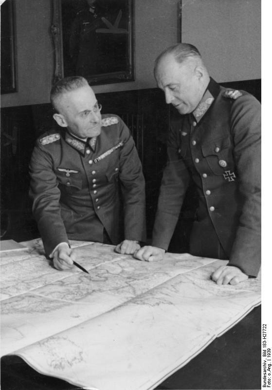 Franz Halder and Walther von Brauchitsch studying a map during the Poland campaign, Sep 1939