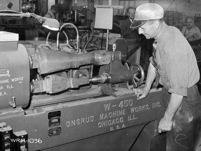 Male worker at the Small Arms Ltd. plant, Mississauga, Ontario, Canada, date unknown