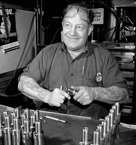 Male worker at the Small Arms Ltd. plant, Mississauga, Ontario, Canada, date unknown