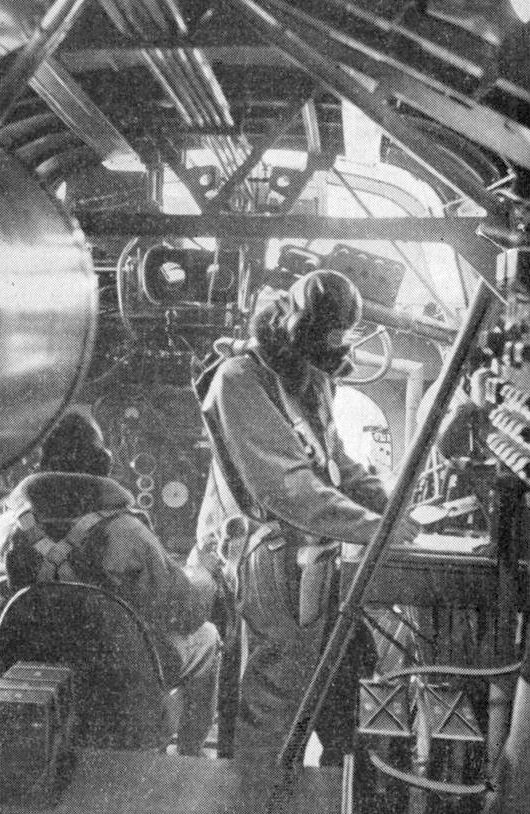 Crew members of a Harrow aircraft in flight, as seen in the May 1938 issue of French publication L'Aerophile