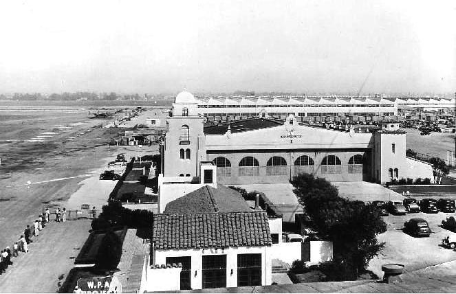 View from the control tower at Mines Field, Inglewood, California showing Hangar No. 1 and the North American Aviation aircraft factory beyond, 27 Aug 1940. Photo 1 of 2.