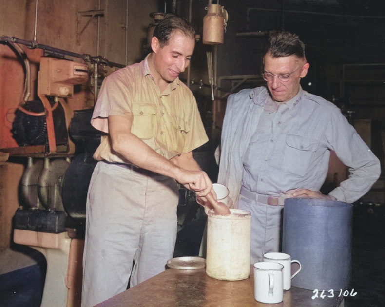 Corporal Abe Brandes serving Lieutenant General Joseph Stilwell ice cream at a US Army ice cream plant in Calcutta, India, 30 Jul 1944 [Colorized by WW2DB]