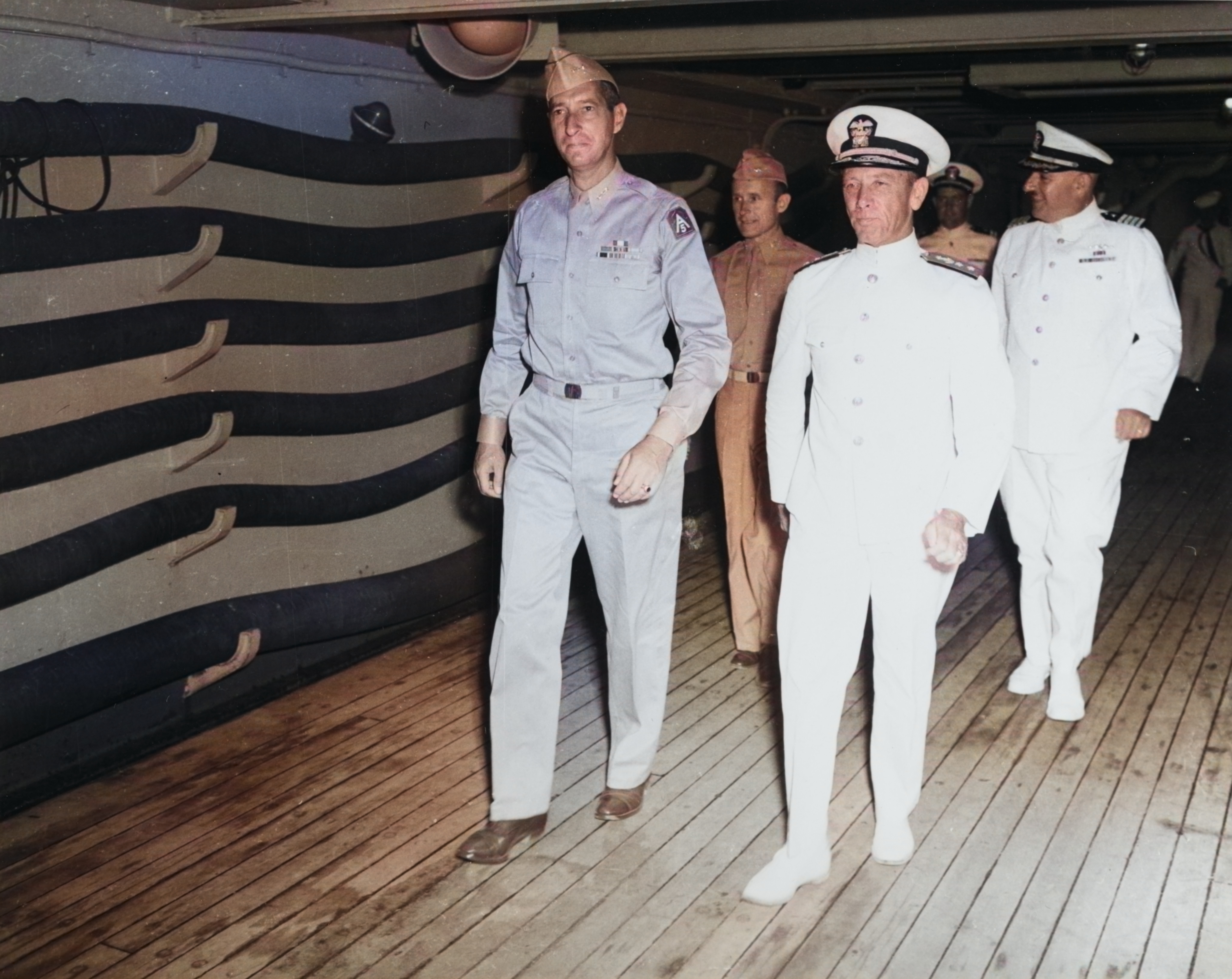 Lieutenant General Mark Clark and Navy Rear Admiral Alan Kirk aboard command ship USS Ancon during the Sicily operations, Mers-el-Kebir, Oran, Algeria, 18 Jul 1943. [Colorized by WW2DB]