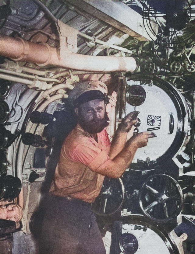 Chief Torpedoman Harold Stromsoe aboard USS S-44, 1943 [Colorized by WW2DB]