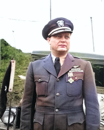 Commodore Leslie Gehres, commander of Fleet Air Wing Four, posing after being awarded the Distinguished Flying Cross, Adak, Alaska, mid-1944. [Colorized by WW2DB]