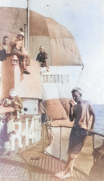 USS R-14 underway with improvised sails, Pacific Ocean, May 1921 [Colorized by WW2DB]