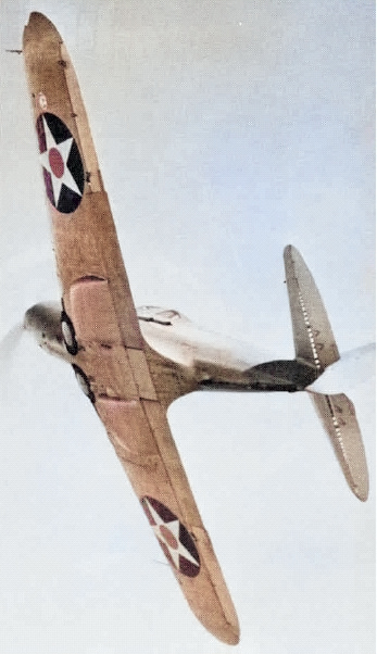 XFL Airabonita prototype aircraft in flight, 1941; seen in Dec 1980 issue of US Navy publication Naval Aviation News [Colorized by WW2DB]