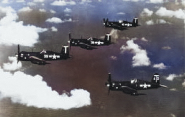 F4U-4 Corsair fighters of US Navy squadron VBF-4 in flight near Saipan, Mariana Islands, 1946-1947 [Colorized by WW2DB]