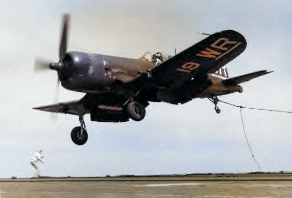 F4U-4B Corsair fighter of US Marine Corps squadron VMF-312 making a bad landing aboard a carrier, late 1940s [Colorized by WW2DB]