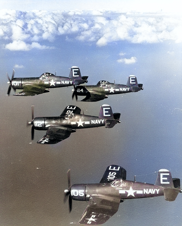 F4U-4 Corsair fighters of US Navy squadron VF-671 in flight over the Mediterranean Sea, 15 Dec 1951 [Colorized by WW2DB]