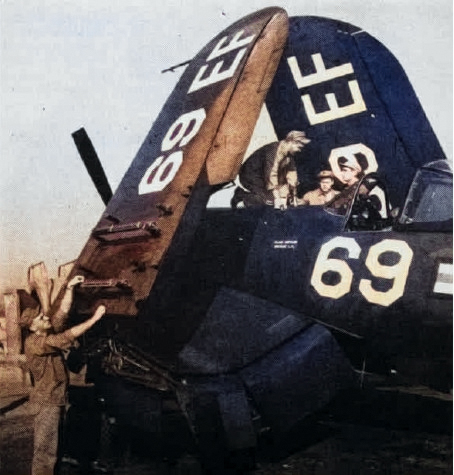 F4U Corsair fighter of US Marine Corps squadron VMF-213 being service, Marine Corps Air Station El Toro, California, United States, 1947; seen in Nov 1947 issue of US Navy publication Naval Aviation News [Colorized by WW2DB]