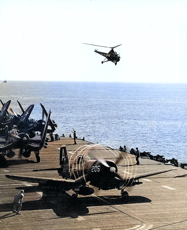 F4U-4 Corsair fighters preparing to launch from USS Boxer off Korea, Jul 1951 [Colorized by WW2DB]