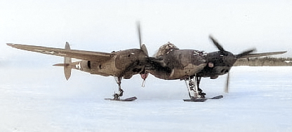 P-38G Lightning aircraft with retractable ski landing gear, Ladd Field, Fairbanks, US Territory of Alaska, winter of 1943-1944, photo 1 of 2 [Colorized by WW2DB]