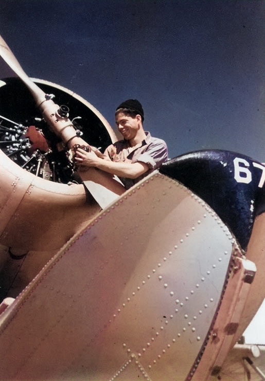 US Navy Aviation Machinist's Mate polishing the propeller of a SOC Seagull floatplane at Naval Air Station, Pensacola, Florida, United States, circa 1940-41 [Colorized by WW2DB]