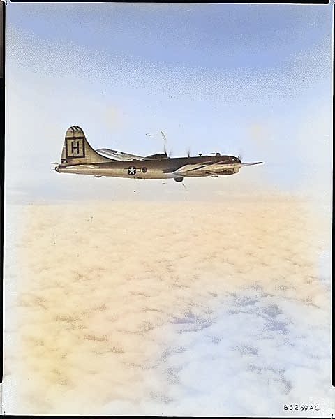 Superfortress flying above clouds, Korea, Jan 1951 [Colorized by WW2DB]