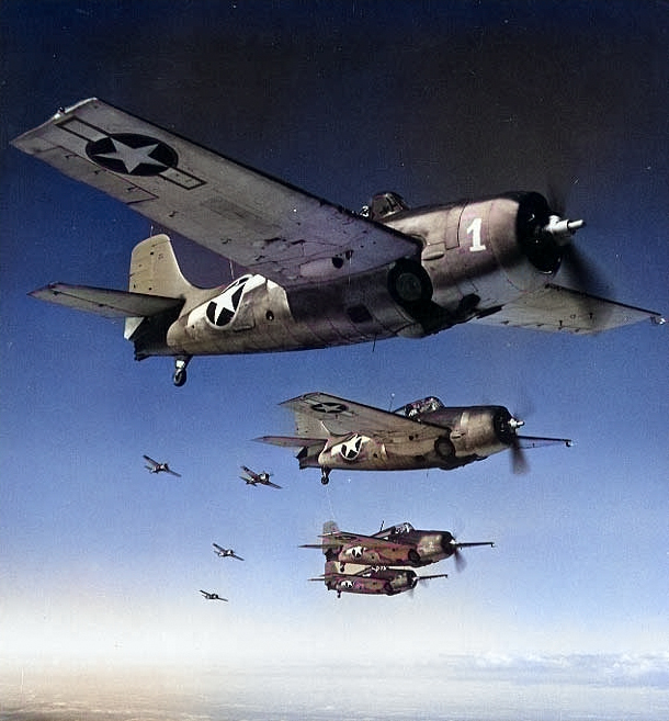 Wildcat fighters flying in formation, circa mid-1943 [Colorized by WW2DB]