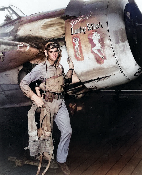 Ensign Darrell Bennett stood beside his FM-2 Wildcat 'Smokey's Lucky Witch', USS Gambier Bay, 1 Aug 1944 [Colorized by WW2DB]