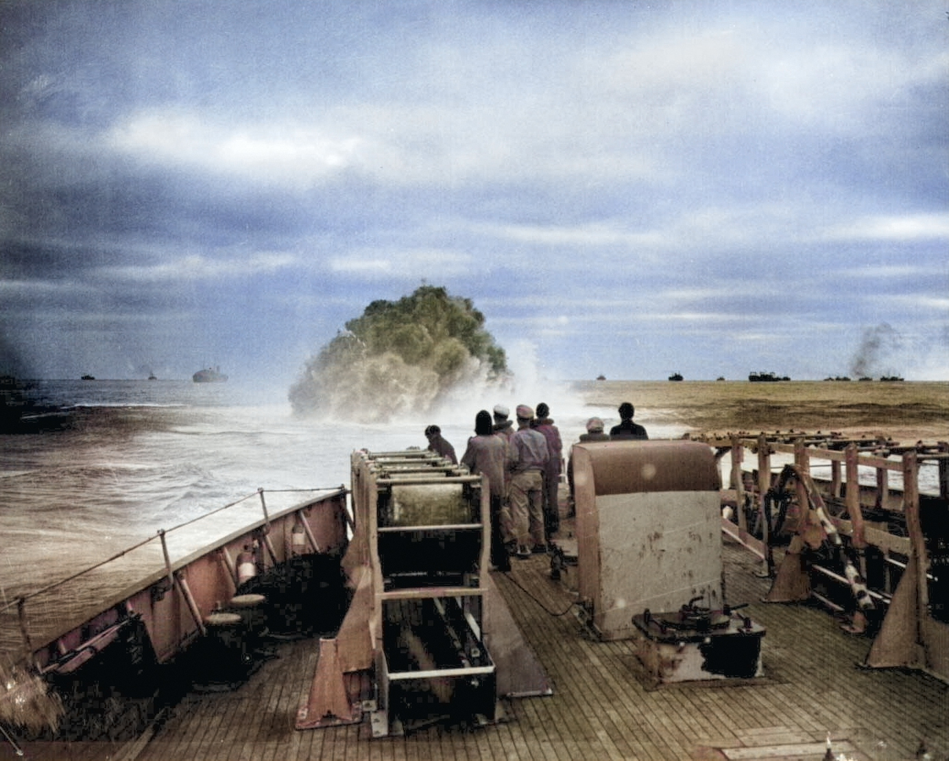 US Coast Guard crew of cutter Spencer watched as a depth charge exploded near U-175, North Atlantic, 500 nautical miles WSW of Ireland, 17 Apr 1943 [Colorized by WW2DB]