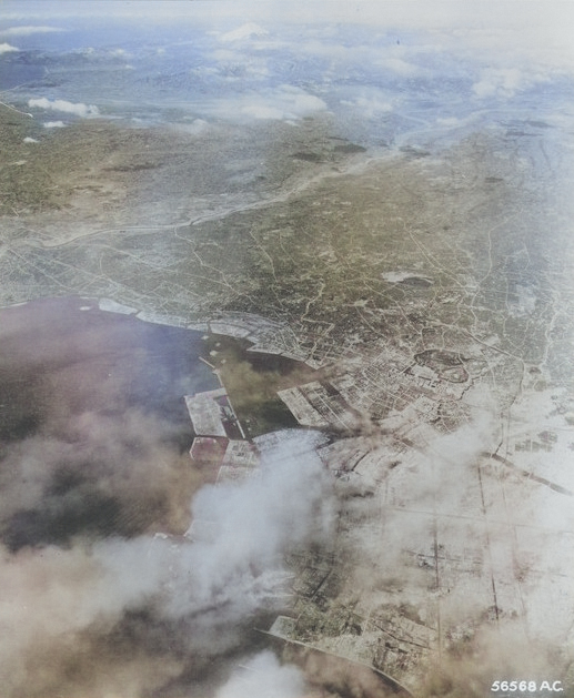 Aerial view of Tokyo, Japan after the 9 Mar 1945 raid, circa 10-15 Mar 1945; photo 1 of 3 [Colorized by WW2DB]