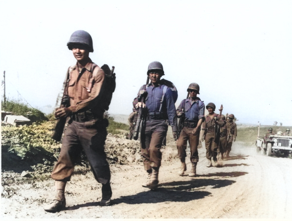 Japanese-American soldiers of the US 100th Infantry Battalion marching in the Valletri area of Italy, 28 May 1944 [Colorized by WW2DB]