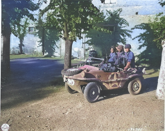 Japanese-American soldiers of the 100th Infantry Battalion of US 442nd Regimental Combat Team in a captured German Schwimmwagen vehicle in the Castellina Sector, near Livorno, Italy, 12 Jul 1944 [Colorized by WW2DB]