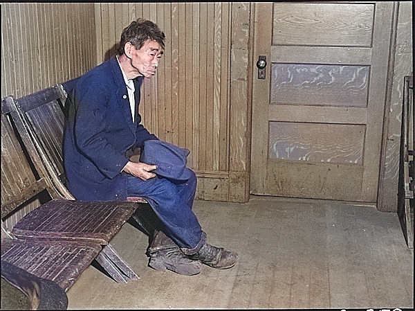 Japanese-American Toshi Mizoguchi waiting at a Wartime Civil Control Administration station to register for evacuation, Byron, California, United States, 28 Apr 1942 [Colorized by WW2DB]