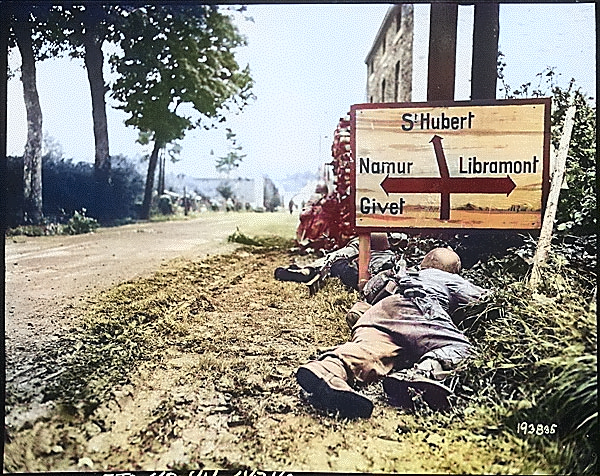 Men of the 8th Infantry Regiment attempted to move forward but were pinned down by German small arms from within the Belgian town of Libin, 7 Sep 1944 [Colorized by WW2DB]