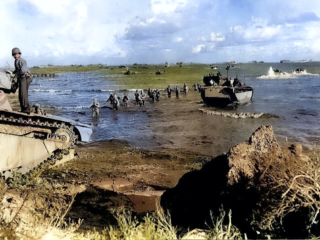 US Marines wading toward Tinian from amphibious tractors and landing boats, Mariana Islands, 25 Jul 1944, photo 1 of 3 [Colorized by WW2DB]