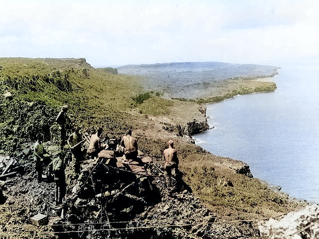 American howitzer 'Miss Connie E' with its US Marine crew, Tinian, Mariana Islands, 25 Aug 1944 [Colorized by WW2DB]