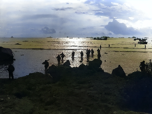 Americans landing on Tinian, Mariana Islands, late Jul 1944 [Colorized by WW2DB]