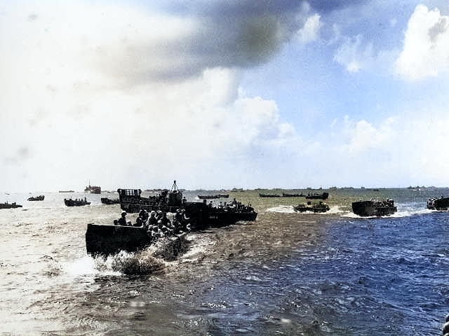 Landing craft moving toward Saipan landing beaches, Mariana Islands, 15 Jun 1944 [Colorized by WW2DB]