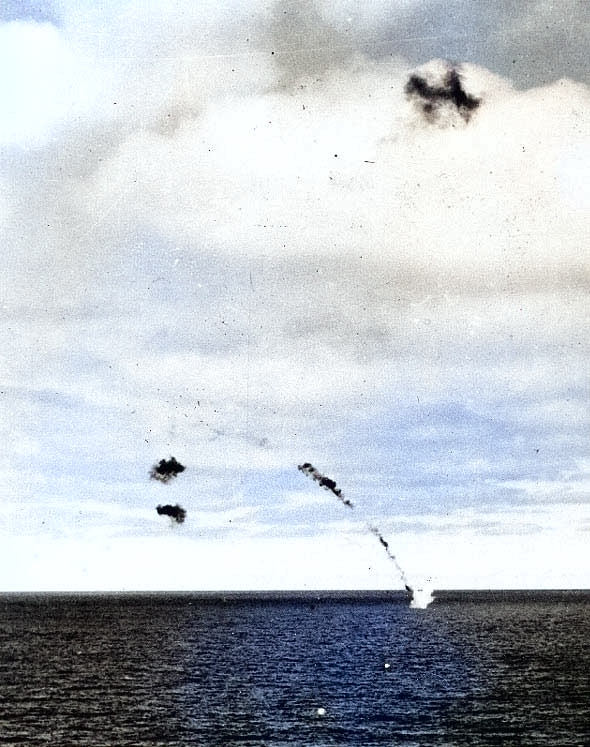 A B5N torpedo bomber shot down by Yorktown's anti-aircraft fire crashing into the sea, 4 Jun 1942, photo 1 of 2 [Colorized by WW2DB]