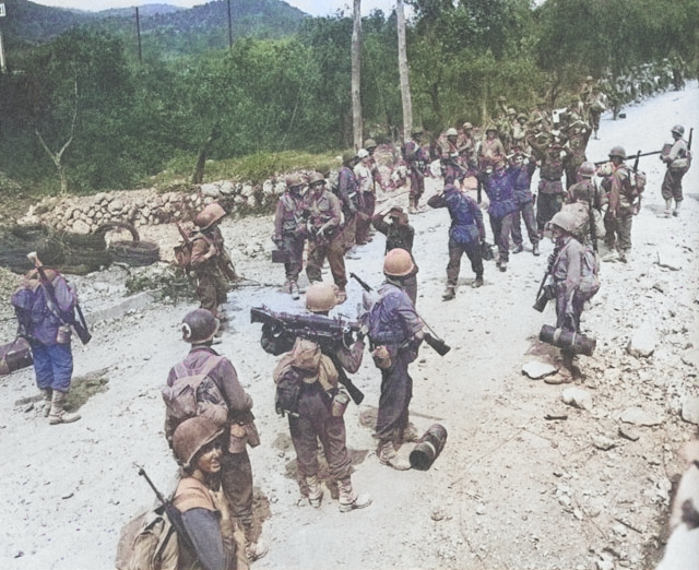 US troops and German prisoners of war near Itri, Italy, 1944 [Colorized by WW2DB]