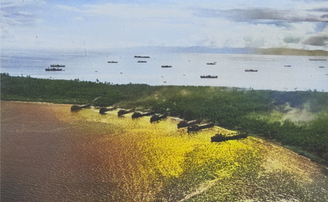 American transports unloading supplies at Morotai, Sep 1944, photo 2 of 2 [Colorized by WW2DB]