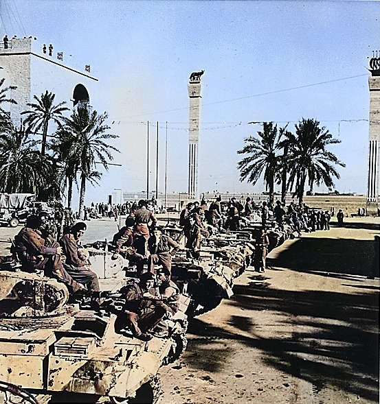 British Valentine II or IV infantry tanks lined up in Tripoli, Libya after they helped capturing the city, circa mid to late Jan 1943 [Colorized by WW2DB]