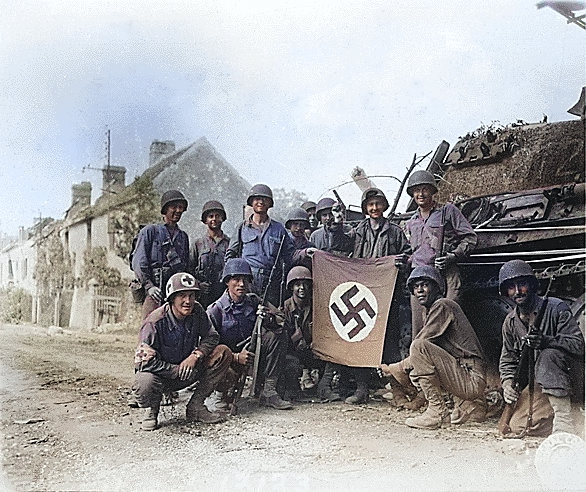 American troops posing with a captured Nazi flag and a wrecked German tank, Chambois, France, 20 Aug 1944 [Colorized by WW2DB]