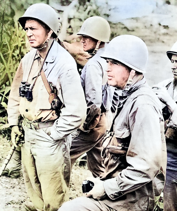 United States Army Lieutenant General Simon Buckner, Jr. (with camera) and Major General Lemuel Shepperd, Okinawa, Japan, circa May-Jun 1945 [Colorized by WW2DB]