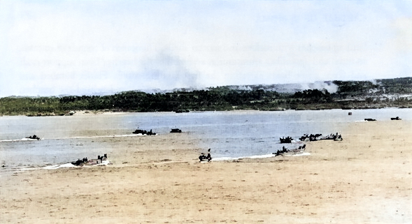 US Army troops aboard LCVP landing craft sailing toward invasion beaches on Ie Shima, Okinawa, Japan, 16 Apr 1945 [Colorized by WW2DB]