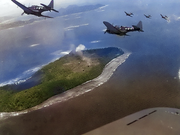 US Navy SBD Dauntless dive bombers over Truk Atoll, Caroline Islands, 16-18 Feb 1944 [Colorized by WW2DB]