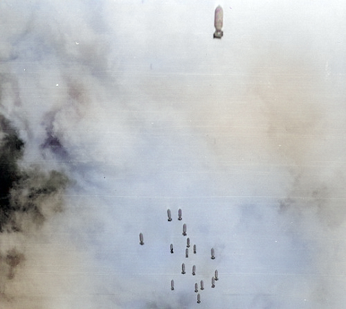 Bombs being dropped over Heito Airfield, Taiwan, 16 Oct 1944 [Colorized by WW2DB]