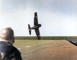 An FM-2 Wildcat in trouble immediately after take-off from USS Sable, Great Lakes, USA, May-June 1943.