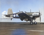 F4U-1 Corsair of VF-17, “The Jolly Rogers,” landing aboard the carrier Bunker Hill south of Bermuda during her shakedown cruise, 17 July 1943. Photo 1 of 2