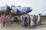 King George VI of Great Britain visits the base of the USAAF 352nd Bomb Squadron at Chelveston, England, UK, 13 Nov 1942. The aircraft is B-17F “Holey Joe” with Cpl David C Casteel of Illinois standing second from the left