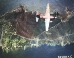 B-26B Marauder of the 441st Bomb Squadron over Île du Levant, France south of St Tropez on raid to bomb gun installations, Aug 4 1944