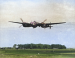 F-5C “All On View” of the 22nd Photographic Recon Squadron makes a low level pass over RAF Mount Farm, Dorchester, England, UK, 1943-45